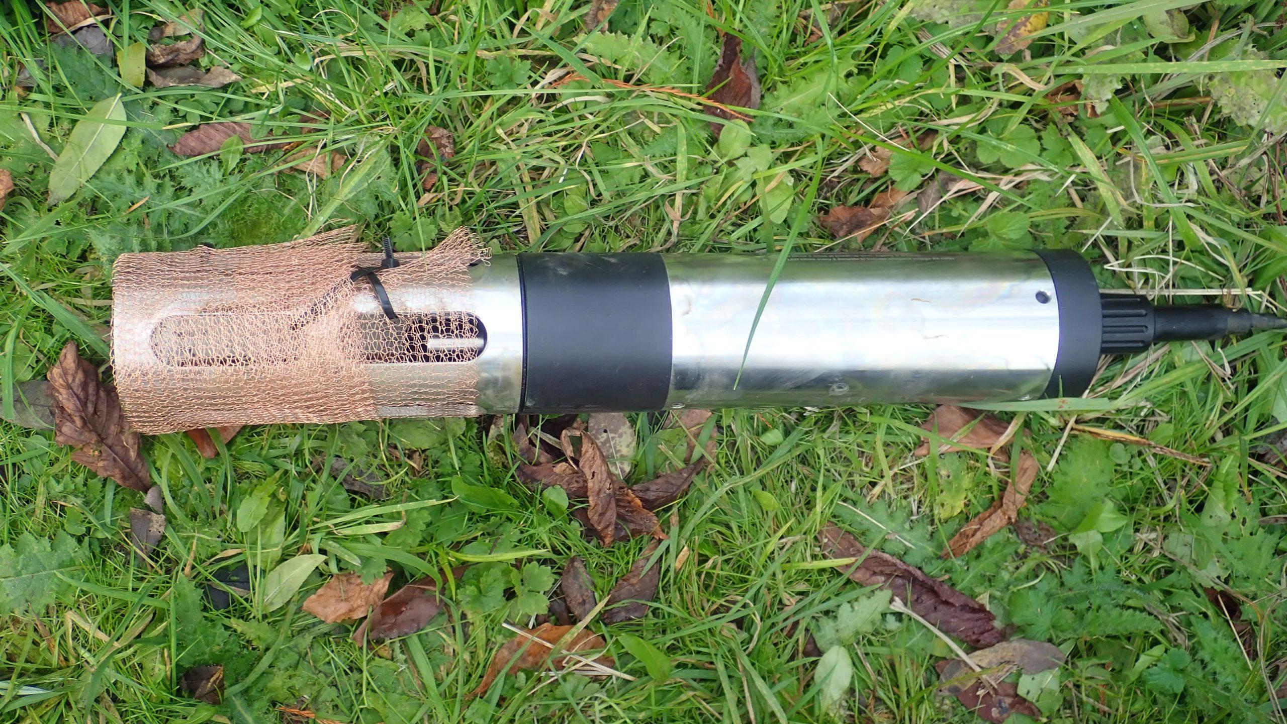 Water quality sonde on grass